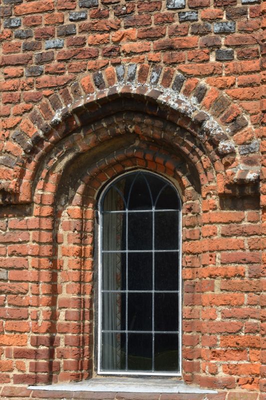 Arched window fitting
